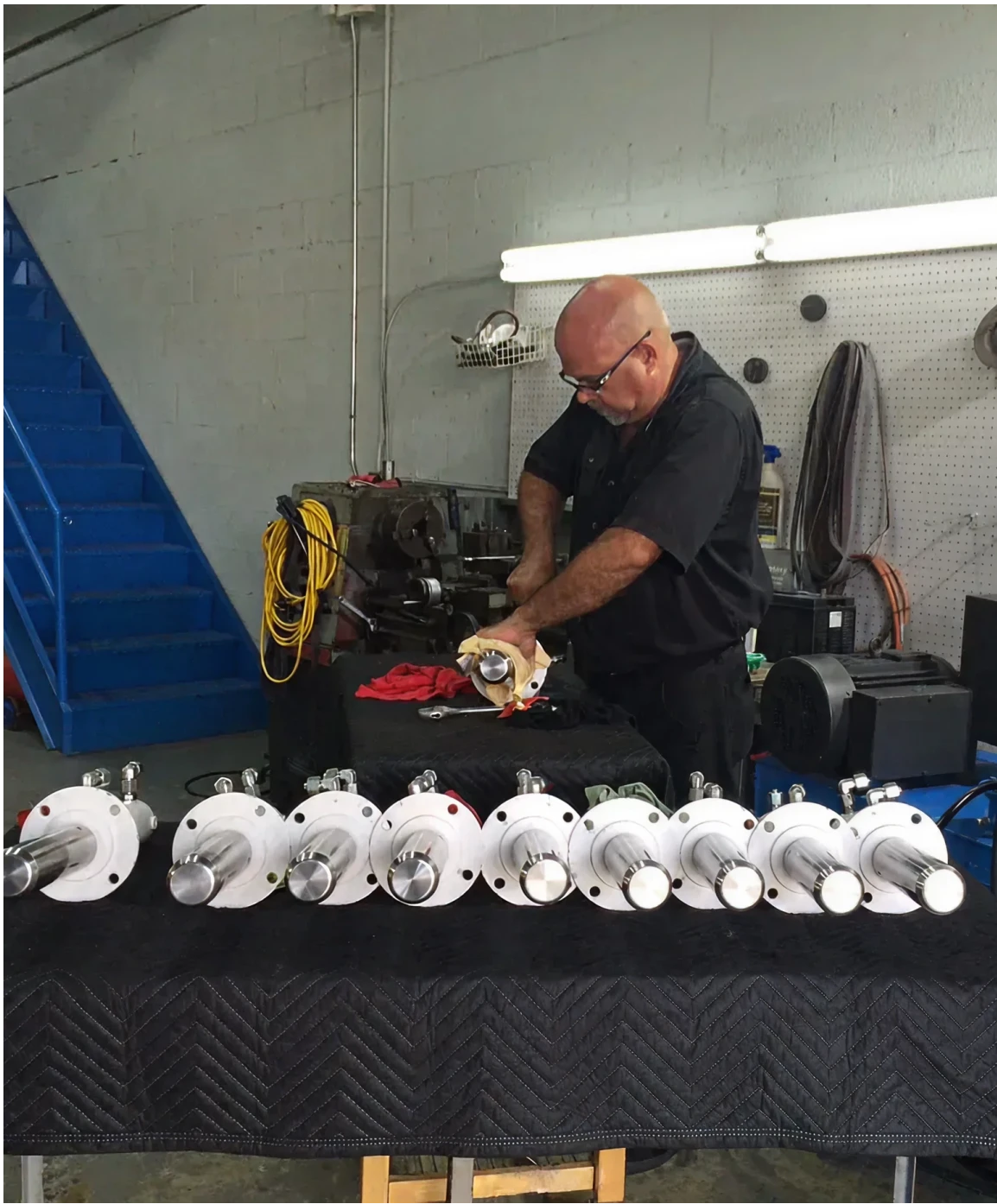Technician inspecting industrial components
